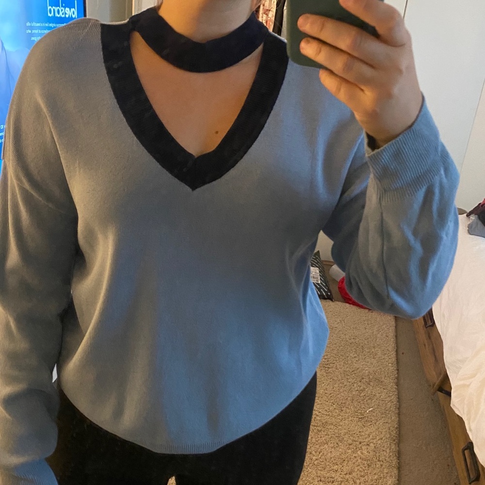 Blue sweater with navy cut out